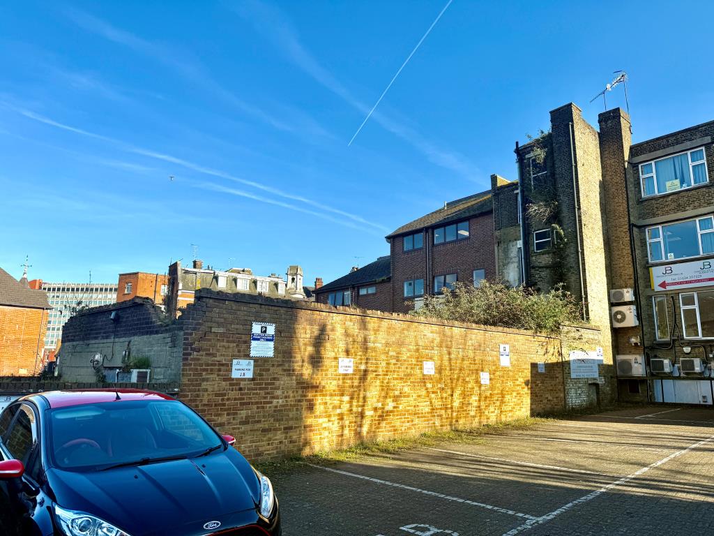 Lot: 72 - PROPERTY WITH PERMISSION FOR SEVEN FLATS AND COMMERCIAL SPACE - Rear of mixed-use building